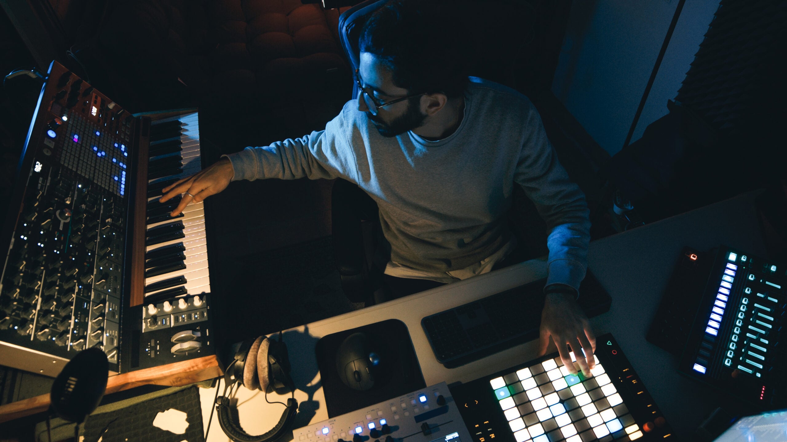 man-working-in-dark-professional-music-studio-2026-09-22-00-23-55-utc